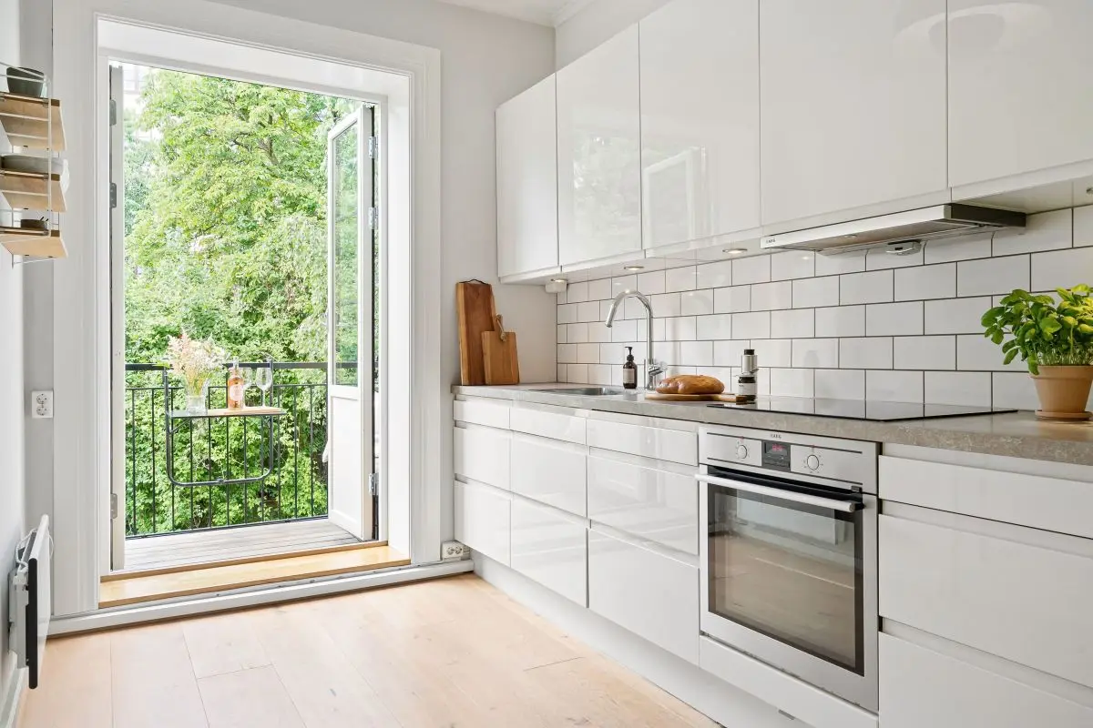 Kitchen with a bright window letting in natural light