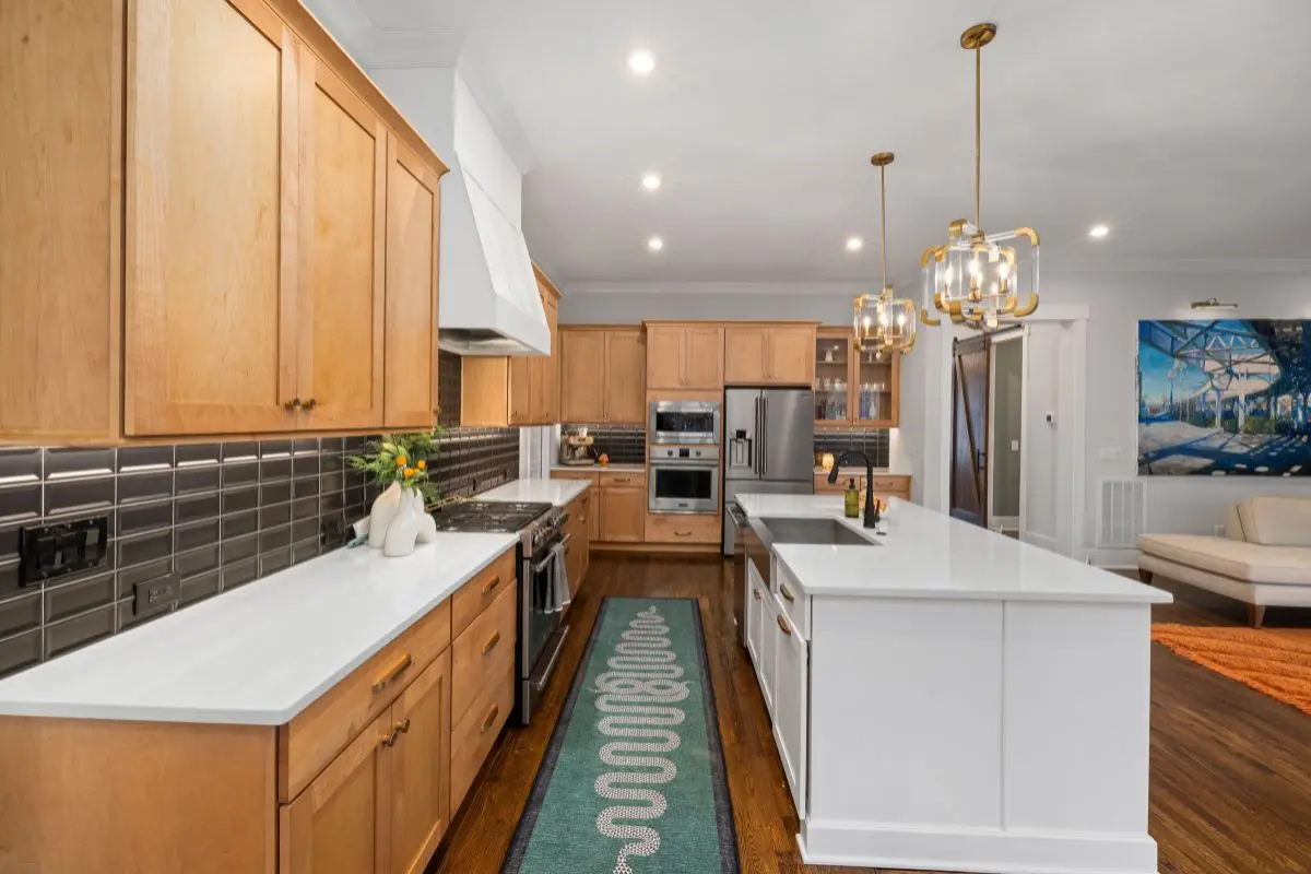 Runner rug down a kitchen galley
